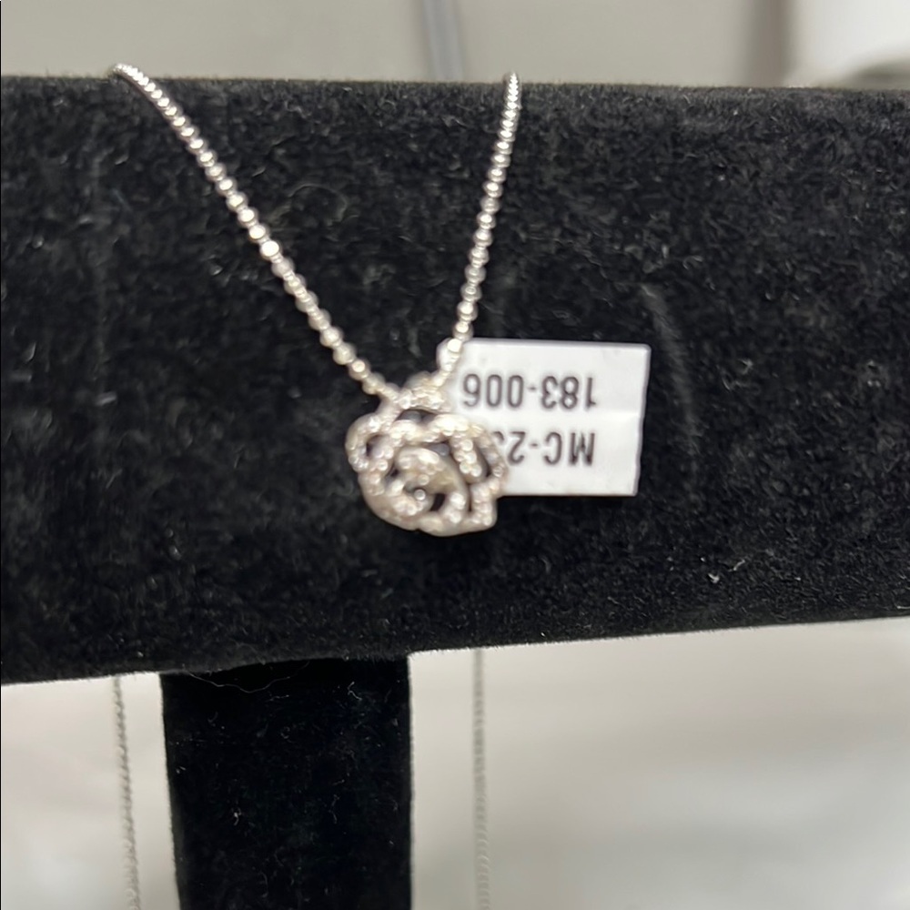 Elegant Silver Necklace with Rose Pendant